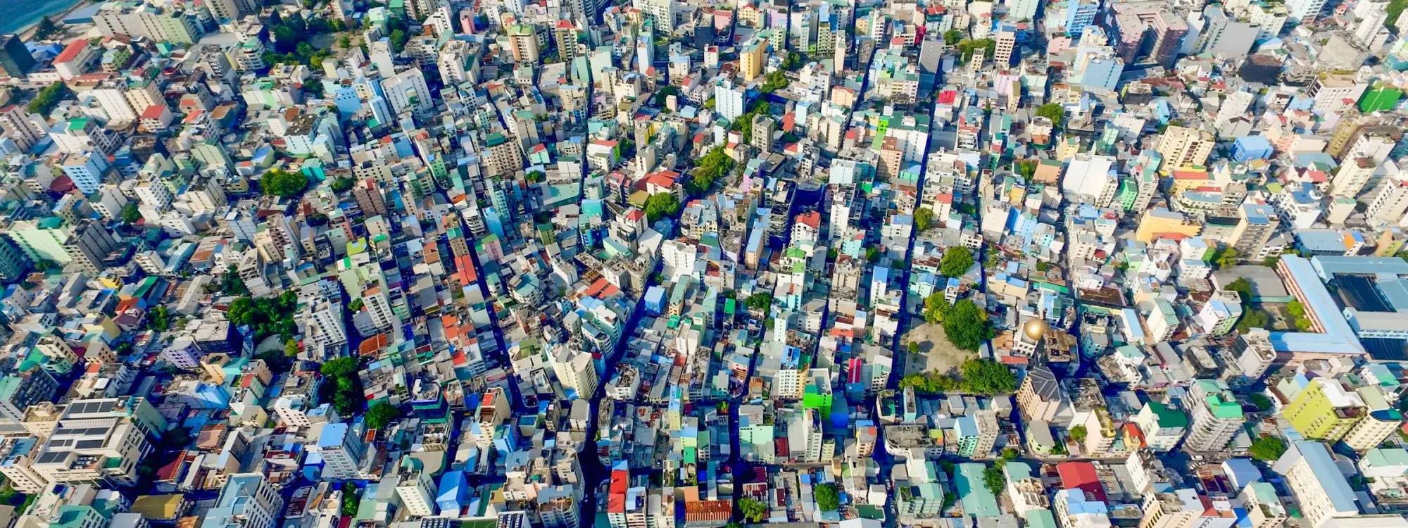 Aerial view of Malé, the island capital of the Maldives, where Aule Consultancy is based.